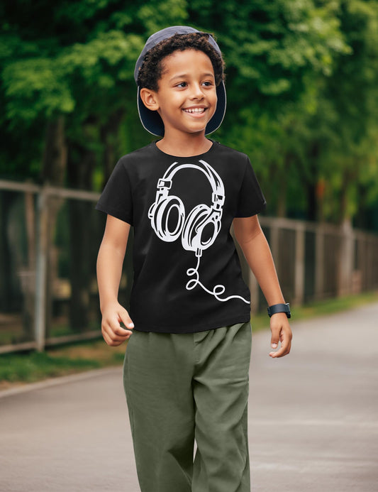 Child wearing a black t-shirt with headphones graphic outdoors