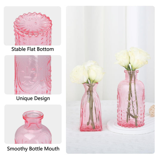 Pink glass vase with floral arrangement on a white background, highlighting design features.