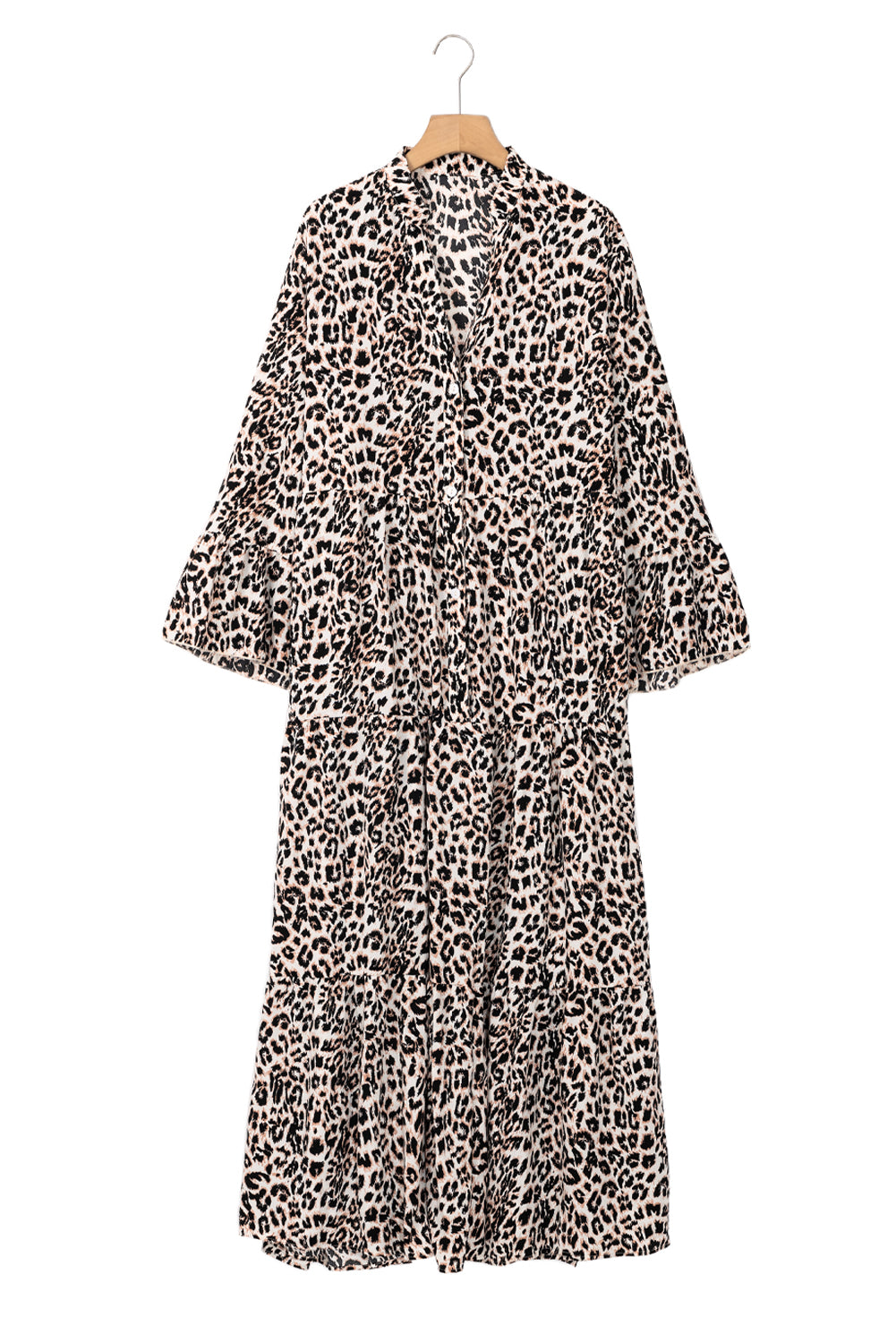 Leopard print dress on a hanger against a white background
