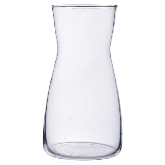Clear glass carafe on a white background