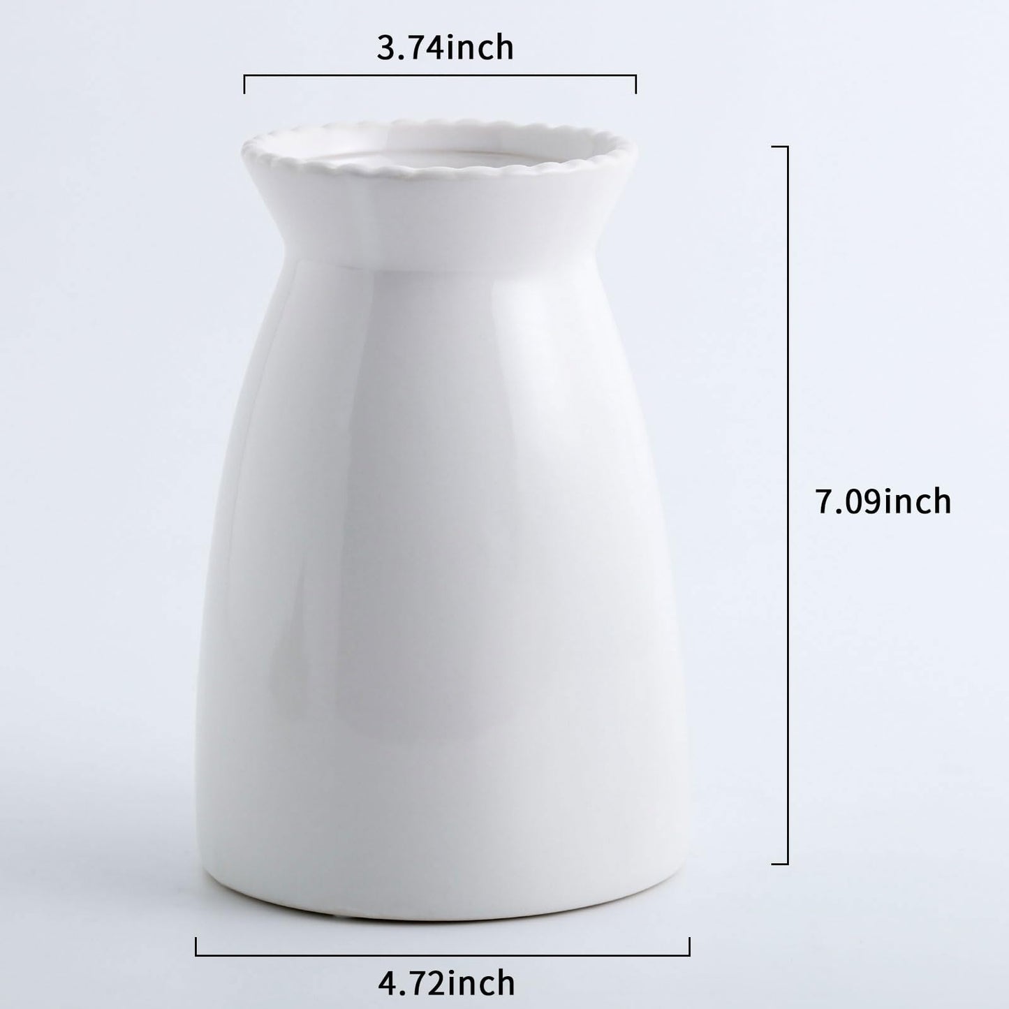 White ceramic pitcher with dimensions labeled on a light gray background