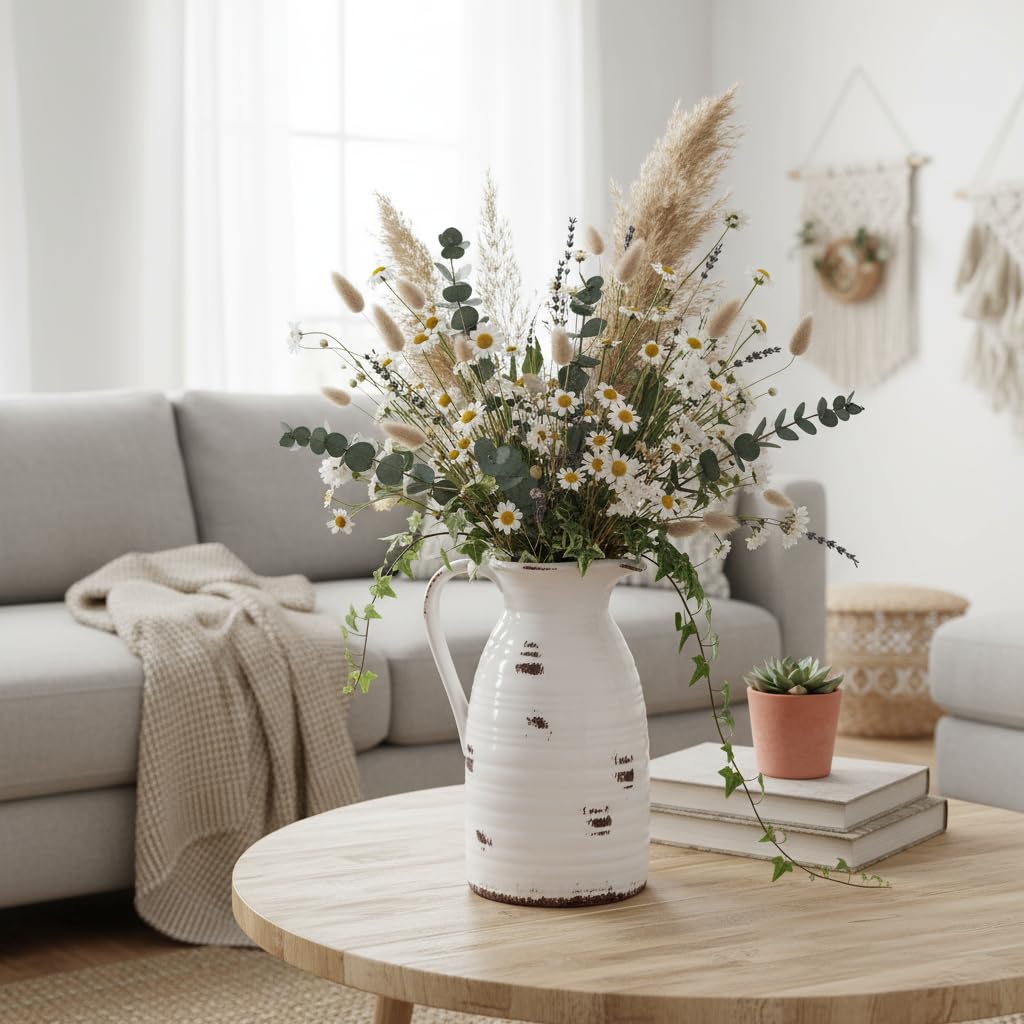 Decorative vase with flowers on a wooden coffee table in a living room.