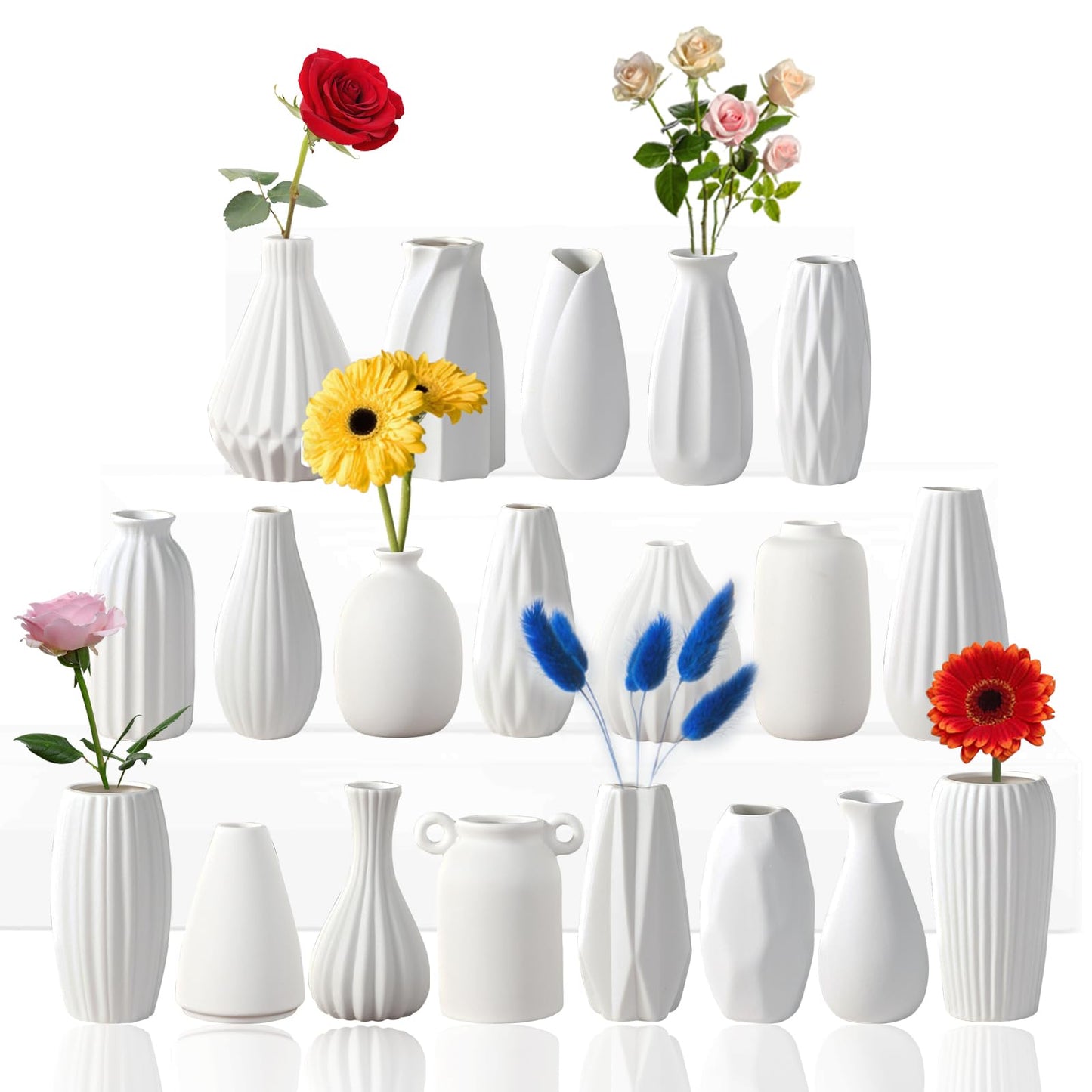 Set of white vases with flowers on a white background
