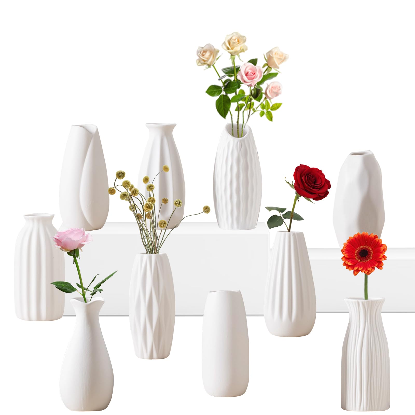 Set of white vases with flowers on a white background