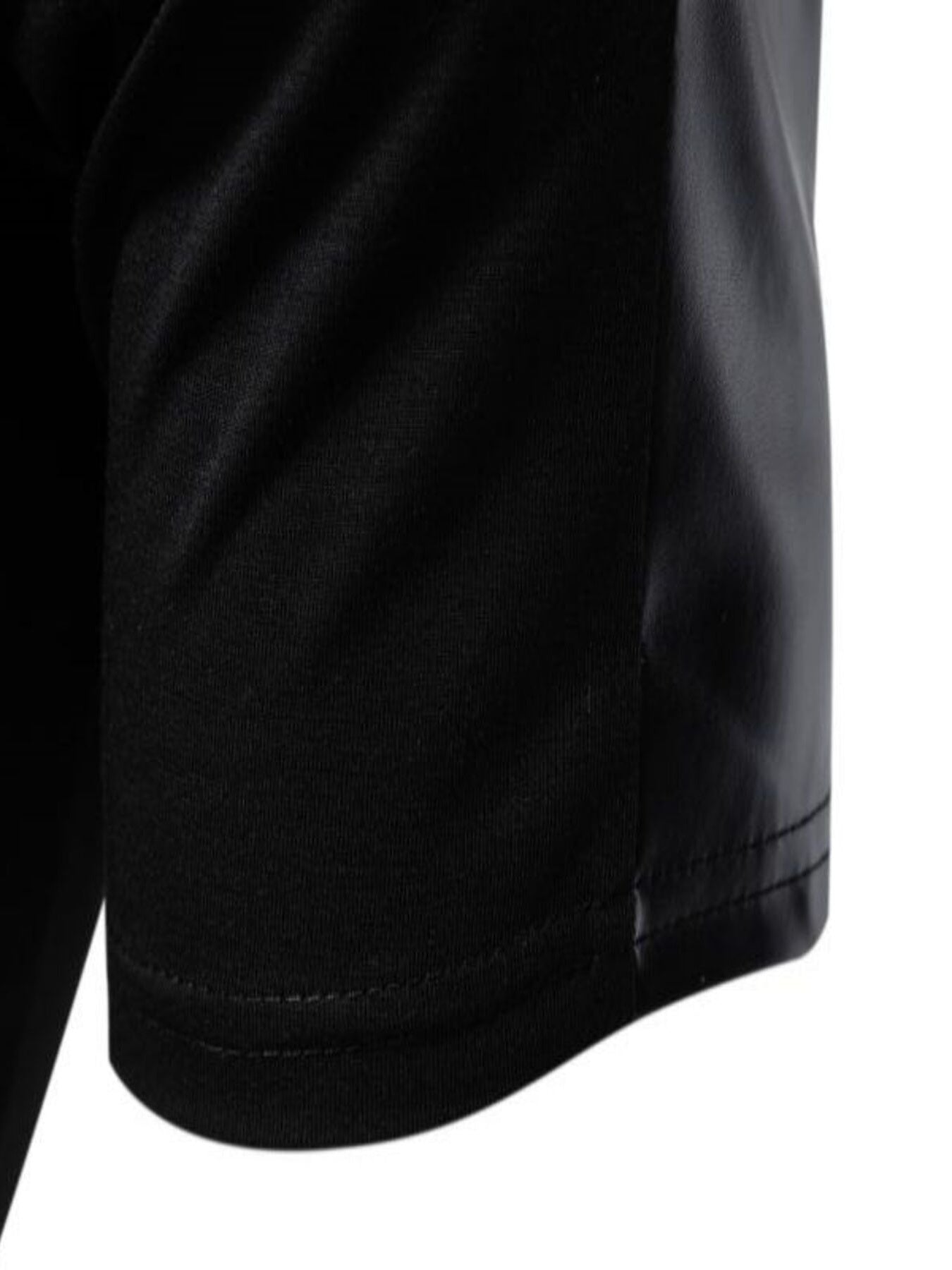 Close-up of a black shirt with a white background