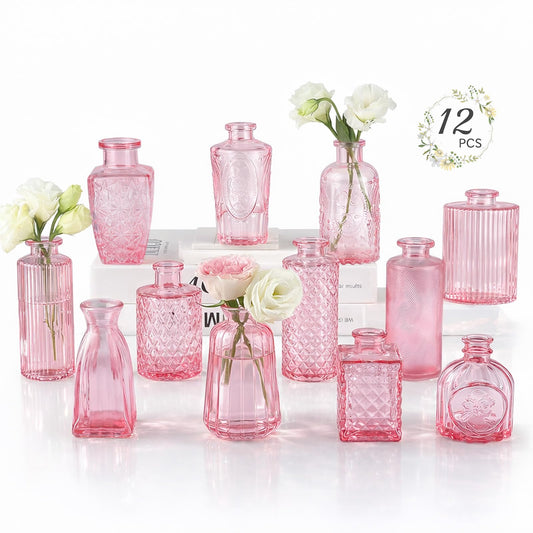 Set of 12 pink glass vases with flowers on a white background