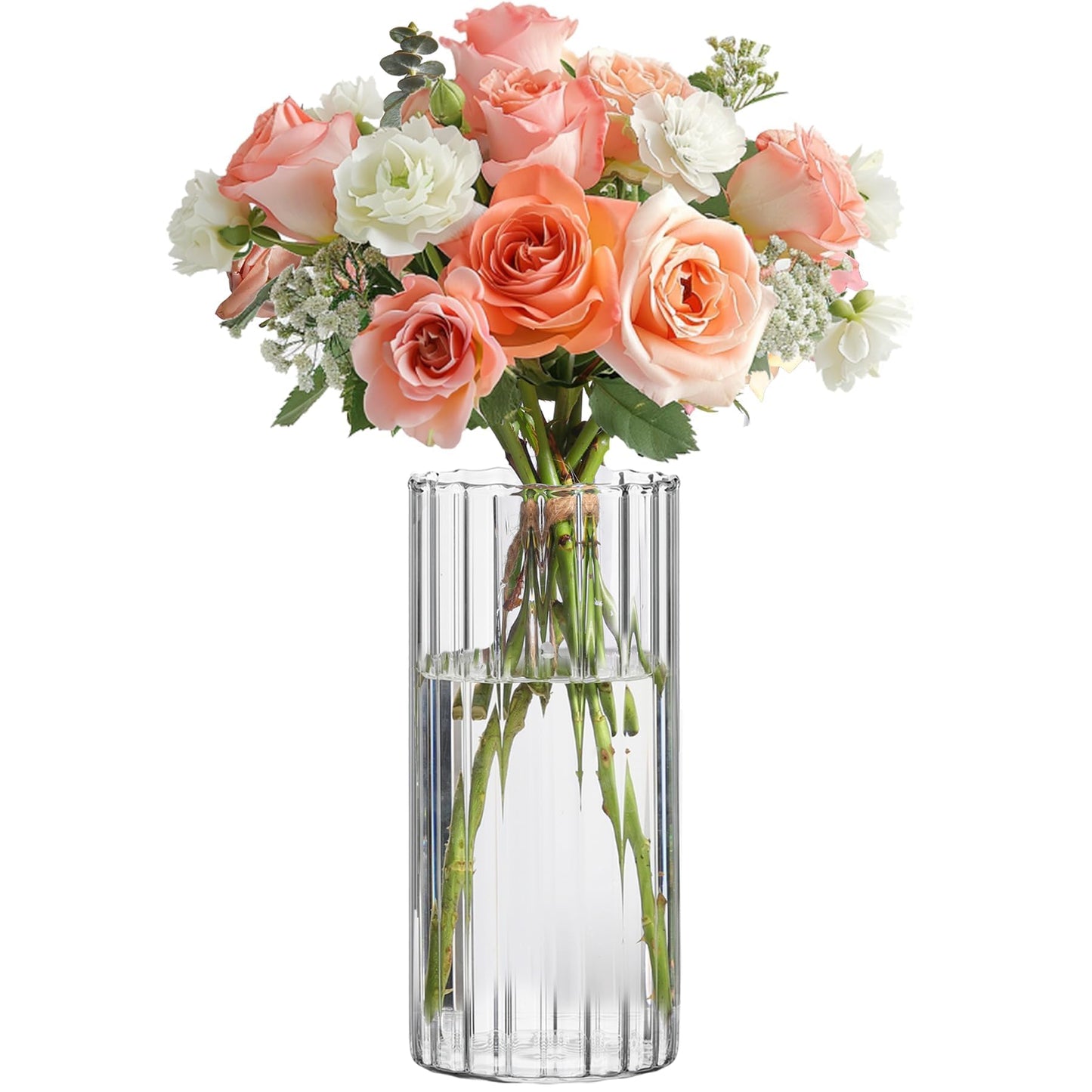 Clear glass vase with a bouquet of pink and white flowers on a white background
