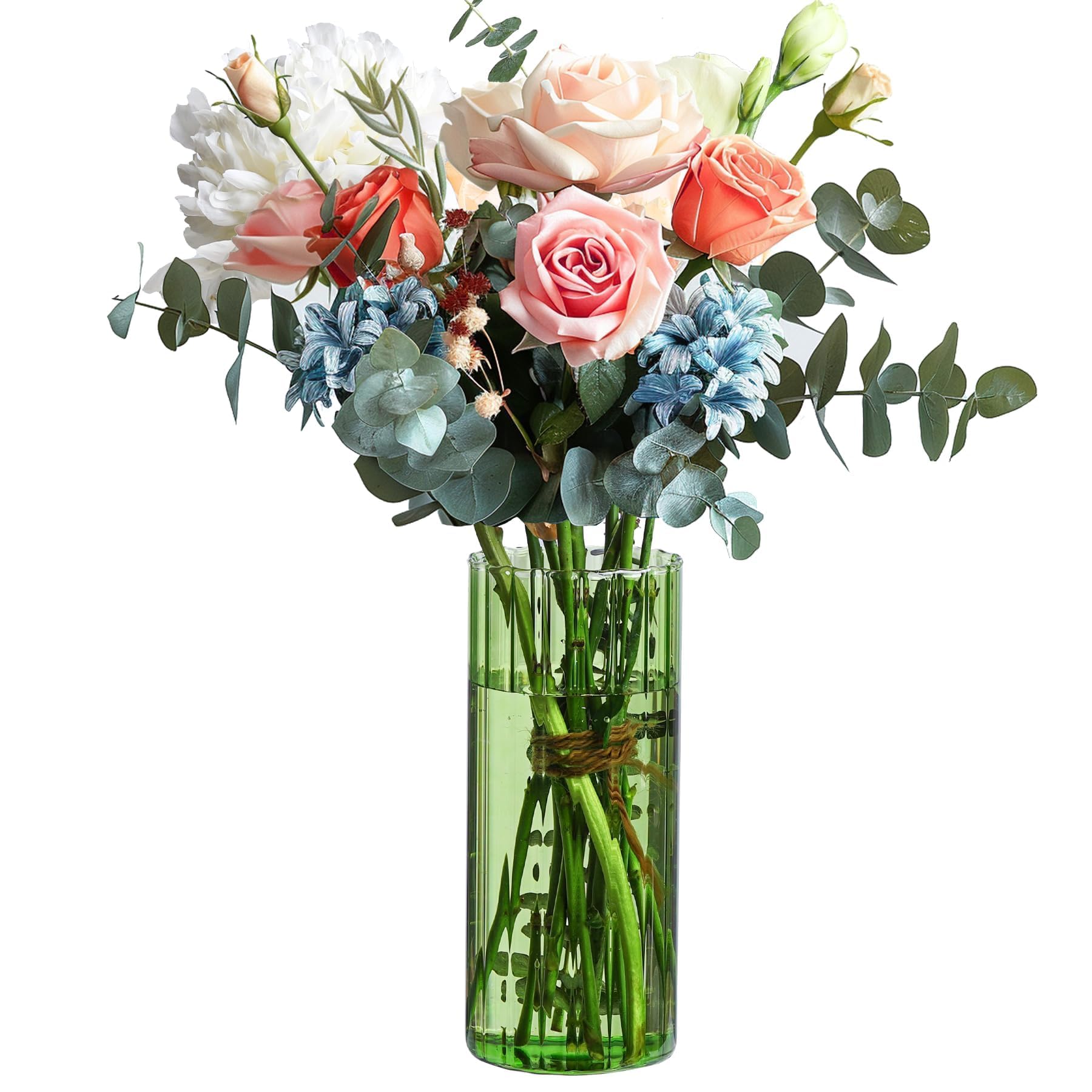 Decorative arrangement with red berries, green leaves, and a vase on a surface.