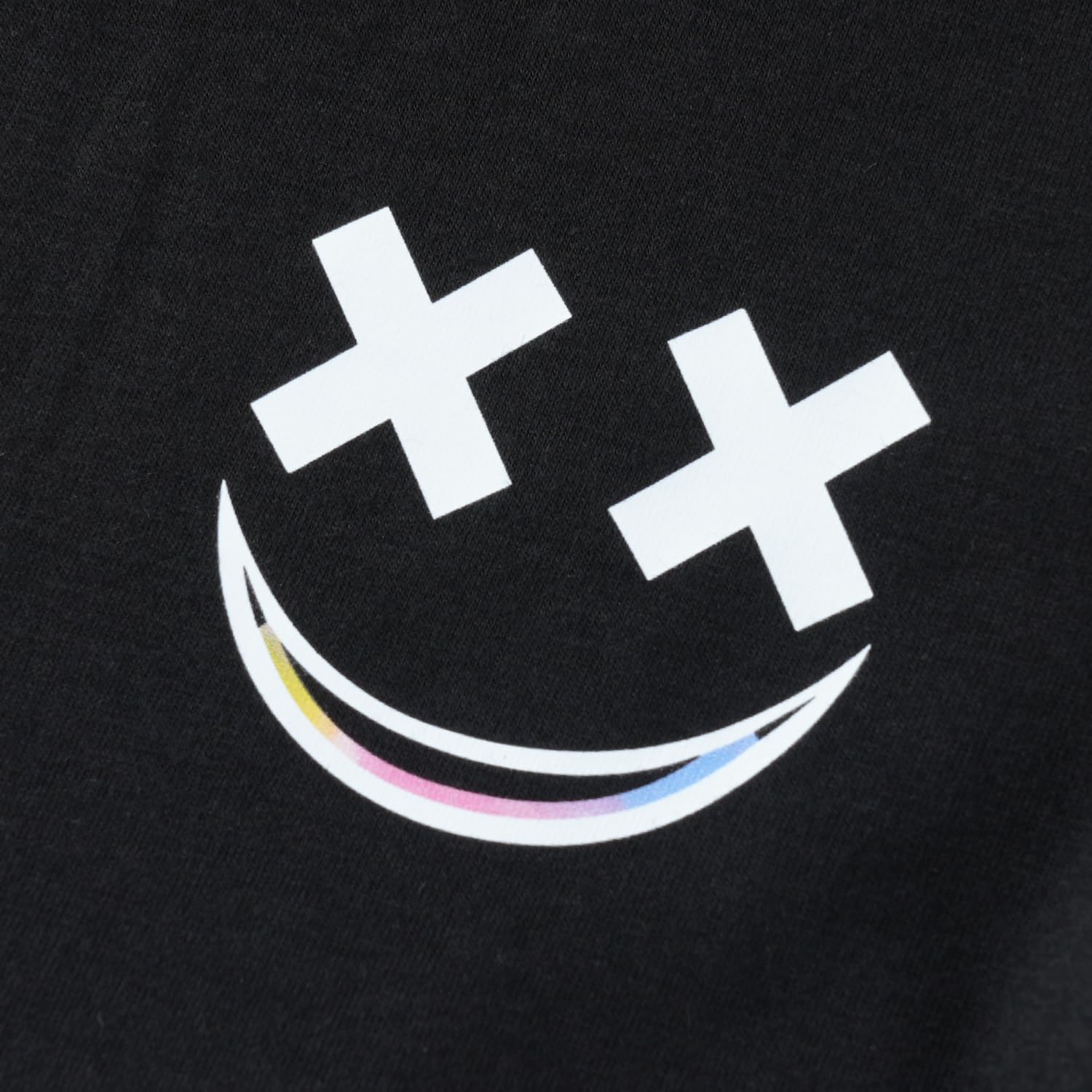 Black t-shirt with a white smiley face design featuring crosses on a black background