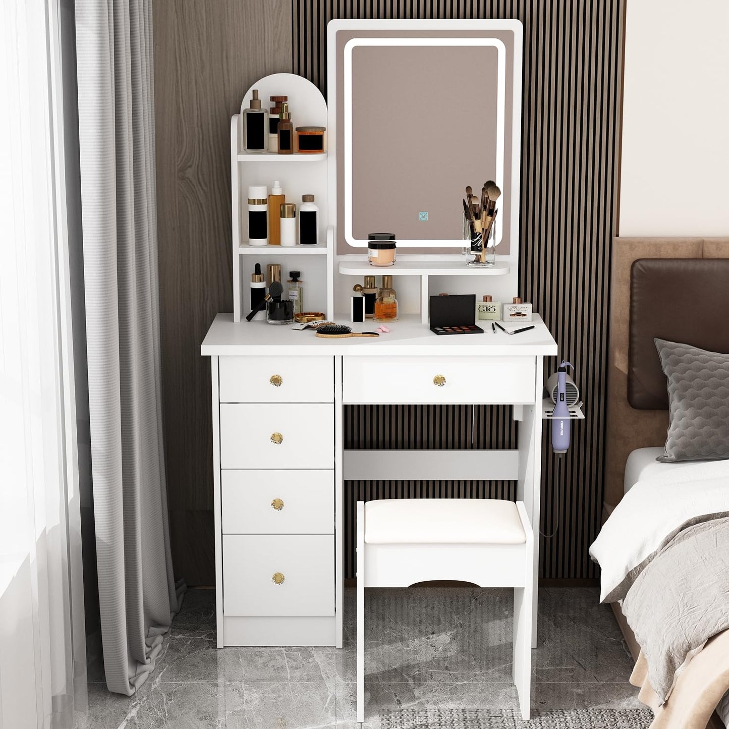 White vanity table with mirror and drawers in a bedroom setting