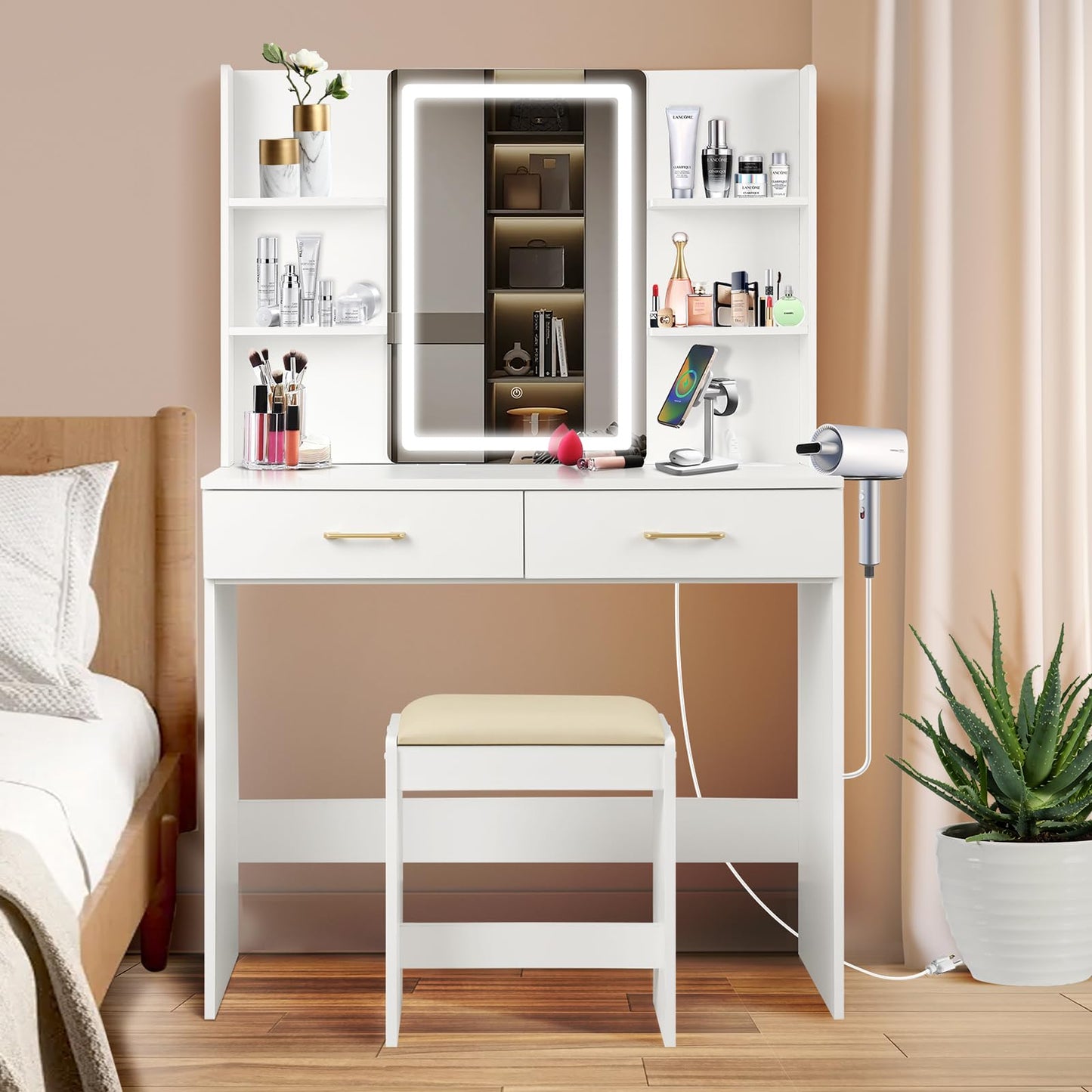 White vanity table with mirror, makeup items, and a stool in a bedroom setting.