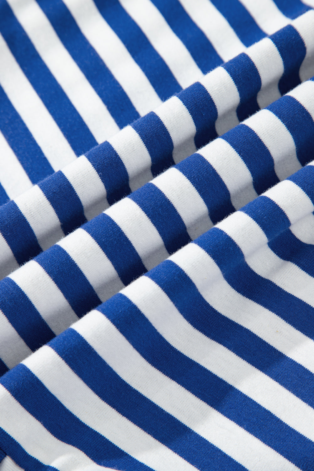 Close-up of blue and white striped fabric
