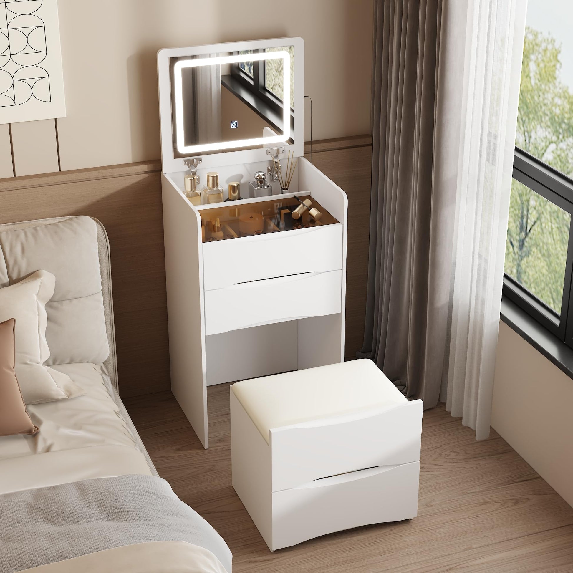 White vanity table with illuminated mirror in a bedroom setting