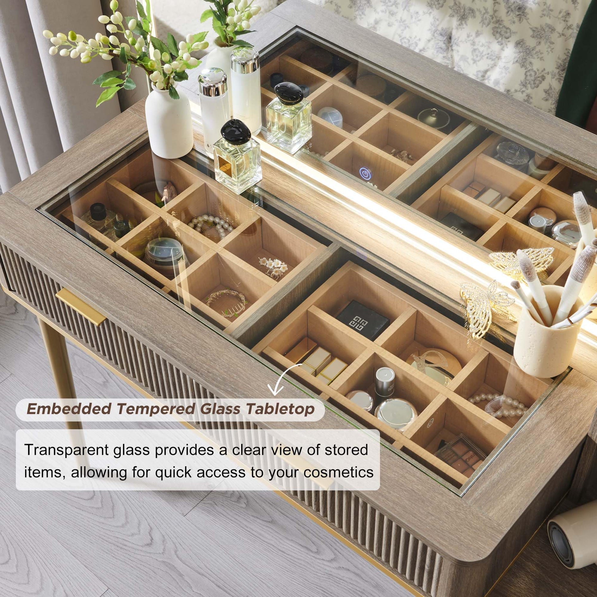 Cosmetic organizer with embedded tempered glass tabletop displaying various items.