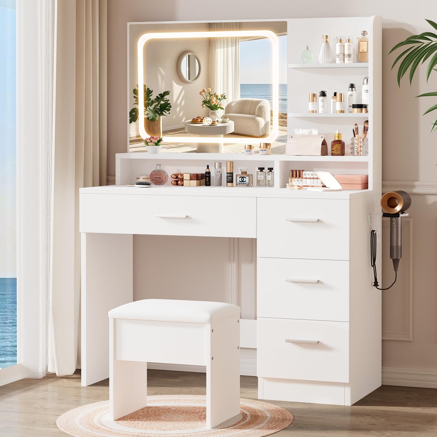 White vanity desk with mirror and shelves in a room with ocean view