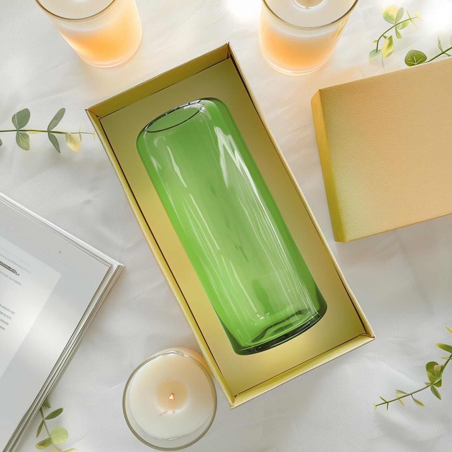 Decorative arrangement with red berries, green leaves, and a vase on a surface.