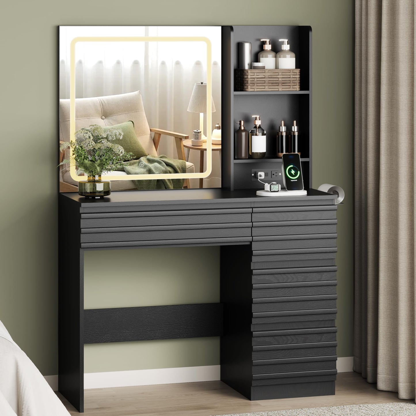 Black vanity table with mirror and shelves against a green wall.