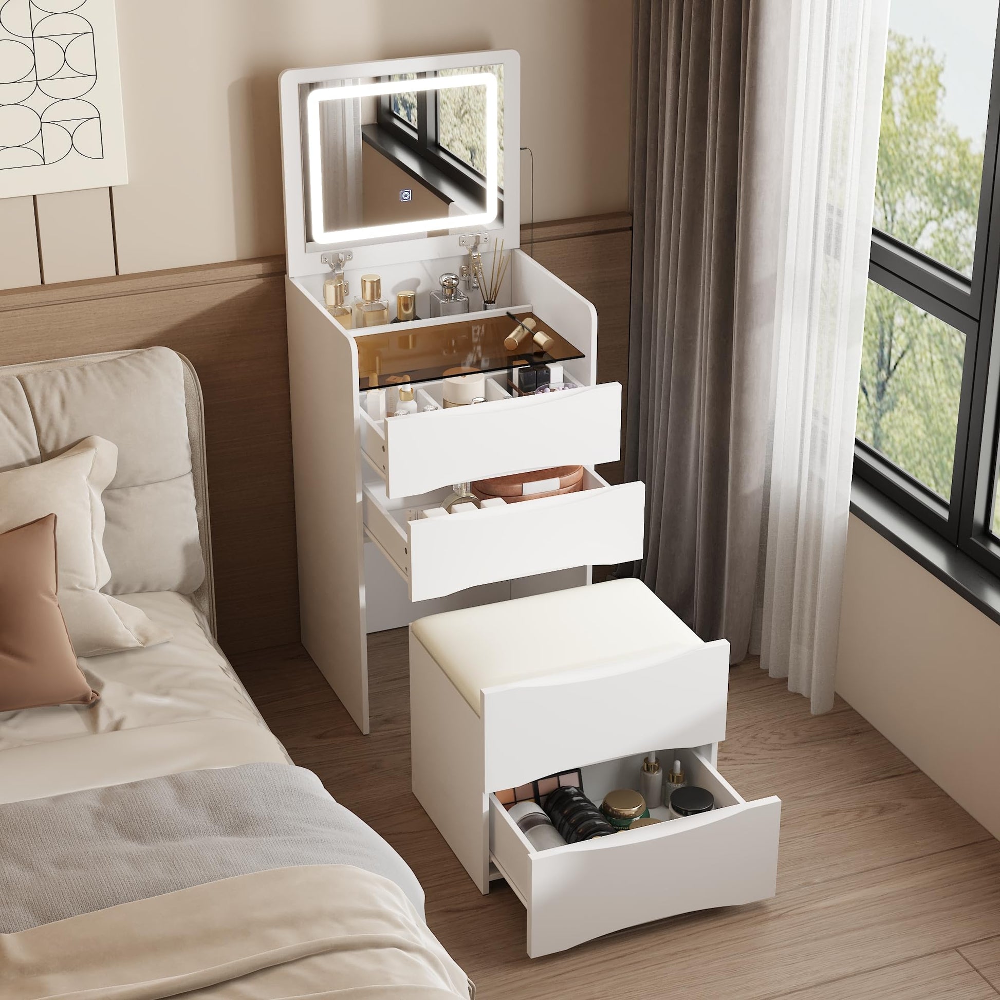 White vanity table with illuminated mirror in a bedroom setting