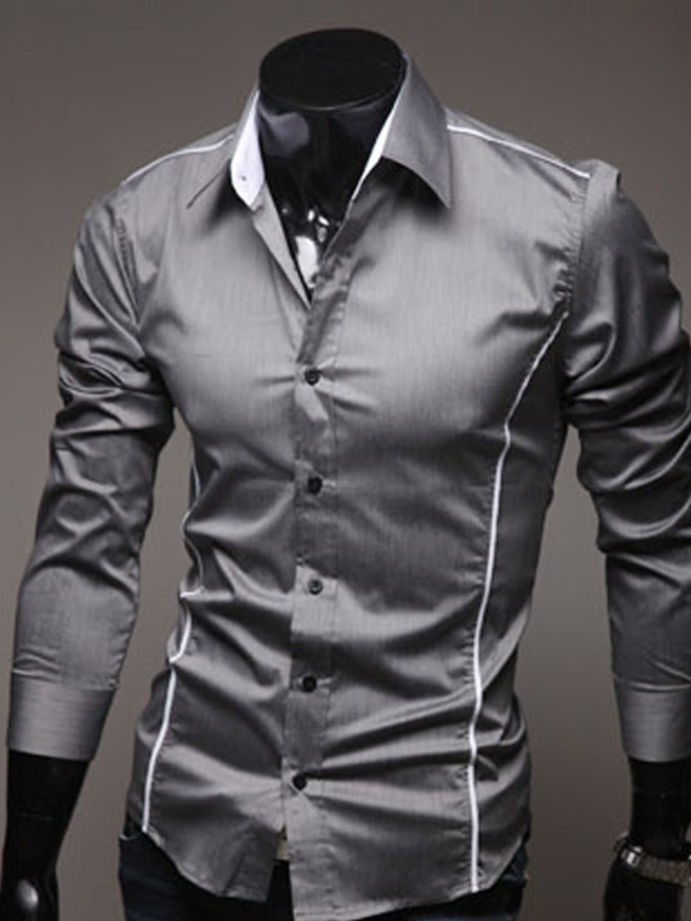 Gray dress shirt with white trim on a mannequin against a gray background