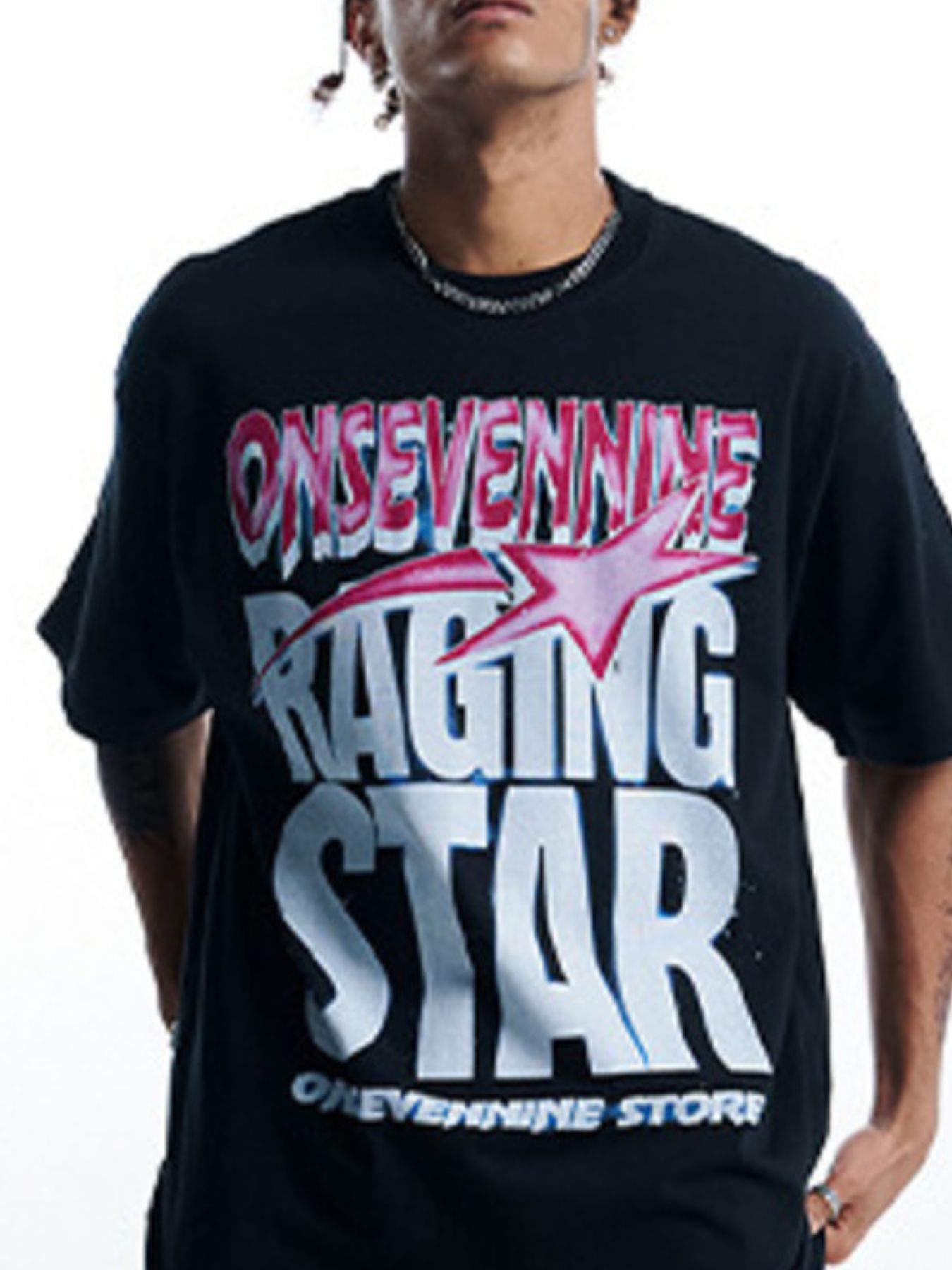 Person wearing a black t-shirt with 'Onsevennine Racing Star' text and logo.