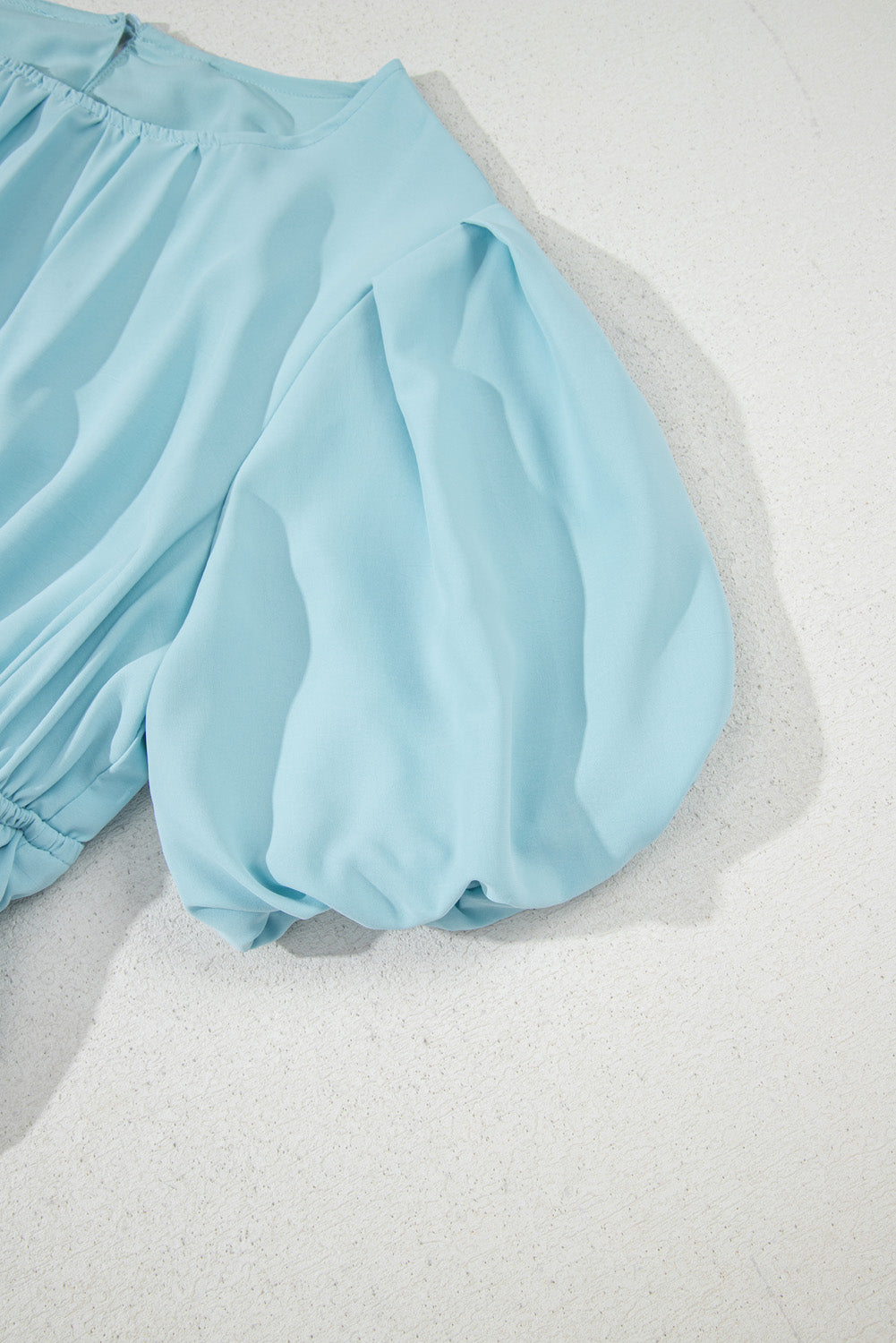 Light blue shorts on a white background